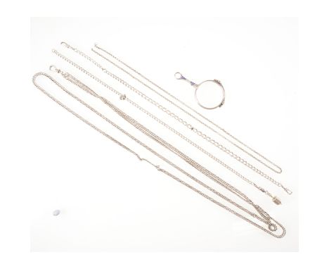 A white metal close curb link guard chain with swivel fastener,170cms long, two watch alberts, belcher link chain and a white