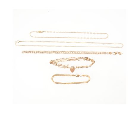 A collection of 9 carat yellow gold bracelets and chains, a gate link bracelet, flat curb link, beaded link (broken), two fin