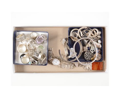 Sixteen modern silver rings, five pairs of earrings, a pair of cufflinks, clog charm, two bangles, bracelet, a lady's silver 