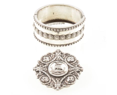 A Victorian silver half hinged bangle, 30mm wide, raised beaded border to front and central band of rondels, hallmarked Birmi