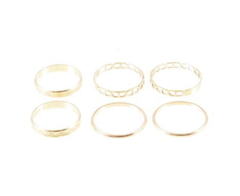 Seven yellow metal rings, narrow bands, one a chain link, all marked 585, total weight approximately 11gms. (7)