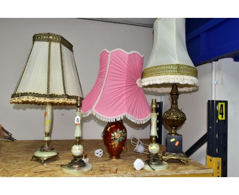 A GROUP OF FIVE TABLE LAMPS, comprising a pair of onyx and gilt metal lamp bases, height 36cm to light fitting, a non-matchin