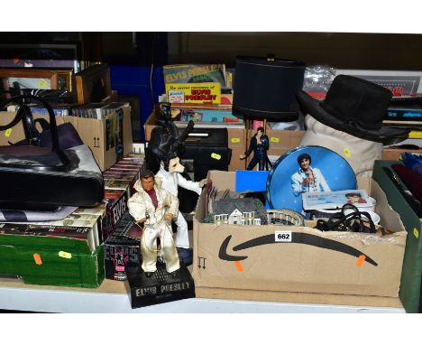 A LARGE COLLECTION OF ELVIS PRESLEY MEMORABILIA AND COLLECTABLES, ETC, to include a Hawthorn Village musical Graceland sculpt