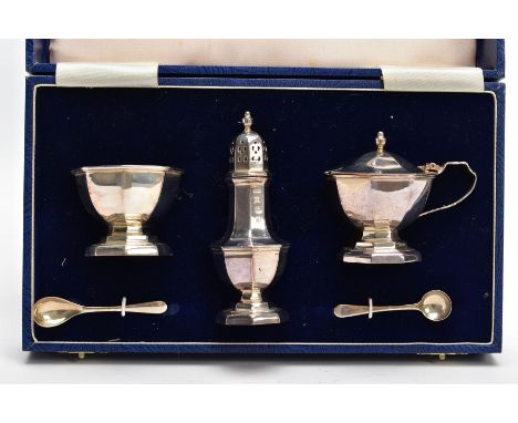 A CASED SILVER CONDIMENT SET, to include a mustard pot and spoon and open salt and spoon, both with fitted blue glass liners,