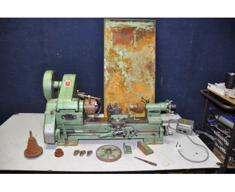 A VINTAGE MYFORD 10 SPEED METALWORKING LATHE with single phase motor, undertray, Myford Toolmec 3 jaw lathe, nine spare geare