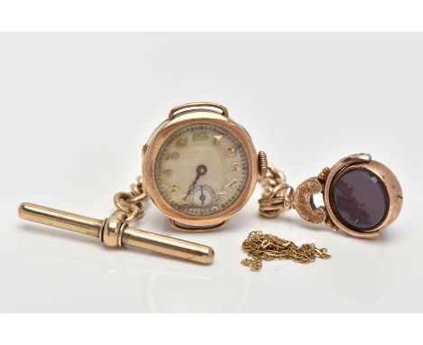 THREE ITEMS OF JEWELLERY, to include a circular 1920's 9ct gold watch head with Arabic numerals, diameter 24mm, gold import m