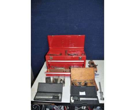 A MODERN ENGINEERS TOOL CABINET containing Vernier Callipers, callipers, dividers, micrometres, drifts, and other marking too