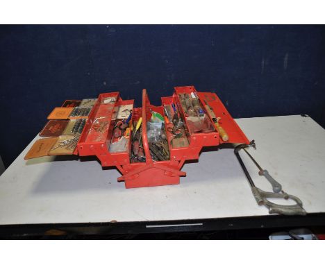 A METAL TOOLBOX CONTAINING TOOLS including Marples and other wood chisels and gouges, Eclipse pad and hack saws, various dril
