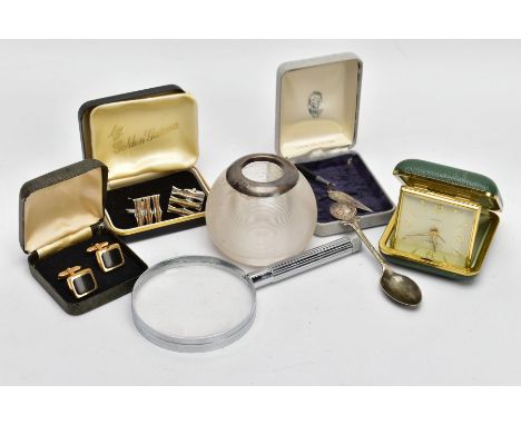 A BOX OF MISCELLANEOUS ITEMS, to include a trowel shaped sliver bookmark, a spherical glass candlestick holder with silver co