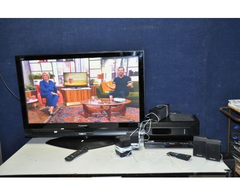 A PANASONIC TH-42PX70B 42in TV with remote and a Panasonic SA-PT450 Home Theatre system with remote, subwoofer and 5 satellit