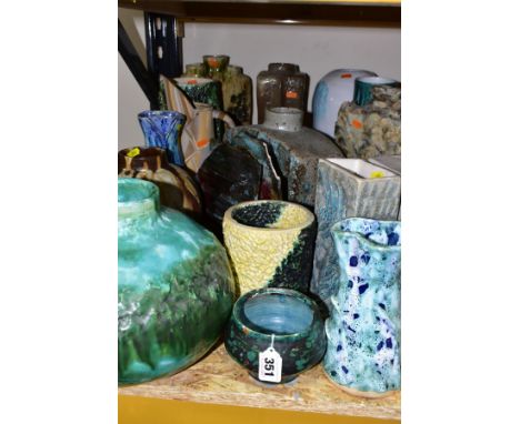 A GROUP OF STUDIO/STONEWARE POTTERY, mostly by Eileen Higgins, to include slab vases, baluster vases, cylindrical vase, floor