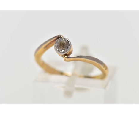 AN EARLY 20TH CENTURY DIAMOND SINGLE STONE CROSSOVER RING, estimated old cut diamond weight 0.20ct, colour assessed as J-K, c
