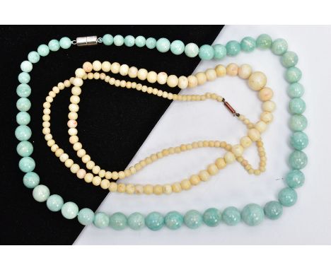 TWO GEM BEAD NECKLACES, both graduated necklaces,  the first a dyed quartz bead necklace, the second pale coral bead, lengths