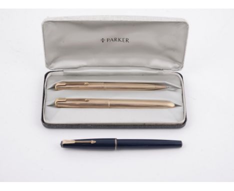 
	
		Parker, 51, a gold plated fountain pen and propelling pencil, the fountain pen cap with arrow clip, hooded nib, squeeze 