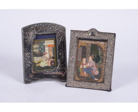 
	
		Y&nbsp; Indian School, Courting couple, watercolour on ivory, mounted in a silver frame, maker's mark SS, London 1983, c