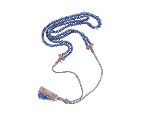 
	
		A sapphire necklace by Natalia Josca, the two strands of graduated facetted sapphire beads, to a plaited thread cord nec
