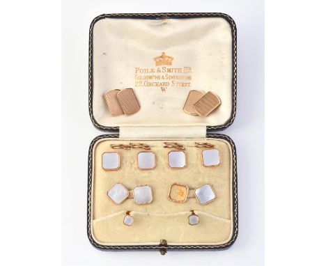 
	
		Y&nbsp;A mother of pearl dress set, comprising; a pair of double sided cufflinks, four shirt studs and two collar studs,