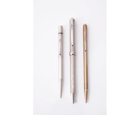 
	
		Pedro Duran, a silver coloured ball point pen, with clip, engine turned decoration and presentation inscription; a silve