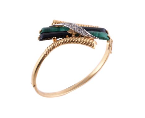 
	
		An Italian malachite, onyx and diamond hinged bangle, set with batons of malachite and onyx and brilliant cut diamond de