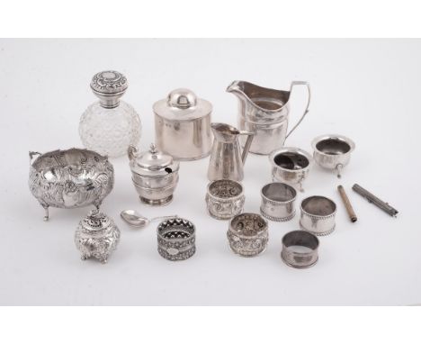 
	
		A collection of silver, silver coloured and silver mounted items, to include: an Edwardian silver oval tea caddy by Geor