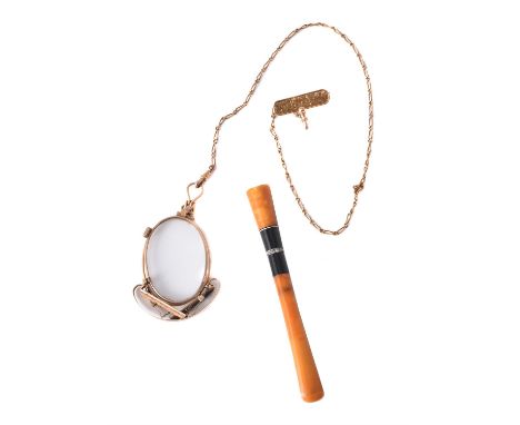 
	
		An Art Deco amber, onyx and diamond cheroot holder, 9cm long, 4.4g gross, in an Asprey case; and a pair of early 20th ce