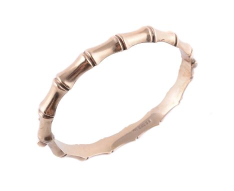 
	
		A 9 carat gold bamboo hinged bangle, hallmarked Birmingham 1964, 12.1g

	

