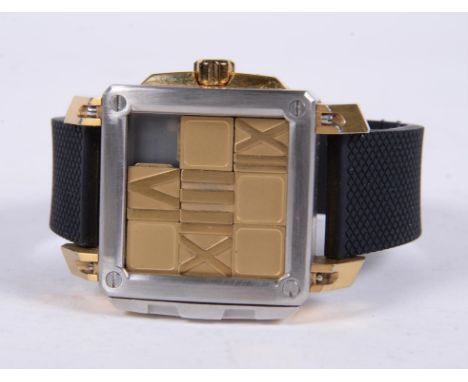 
	
		Ritmo Mundo, Puzzle, Ref. 501,
		Limited edition bi-colour wrist watch, no. 016/100
		Movement: Swiss automatic, 26 jewe