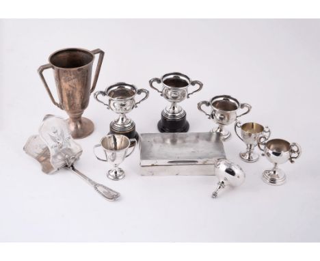 
	
		A collection of silver items, to include: a twin handled trophy cup by Deakin &amp; Francis, Birmingham 1940, with twin 