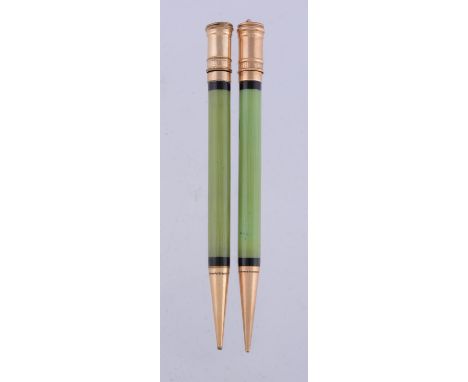 
	
		Parker, two green and gold filled propelling pencils, marked Parker U.S.A (2)
		
		Condition Report: 
		Light scratches 
