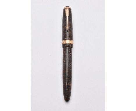 
	
		Parker, Vacumatic, a brown striated fountain pen, the cap with a gilt arrow clip and cap band, the nib stamped 14K, with