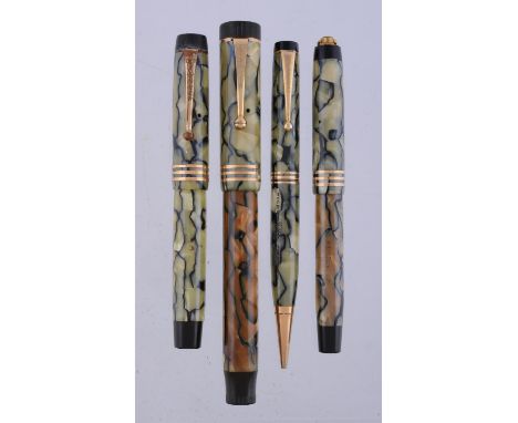 
	
		Parker, Duofold Lucky Curve, a green and brown marbled fountain pen, the cap with a gilt clip and triple cap band, butto