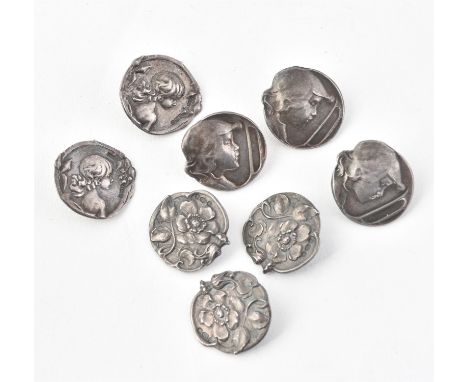 
	
		Eight Art Nouveau silver buttons, three by William Hutton &amp; Sons Ltd., Birmingham 1905, chased with child, 22mm diam