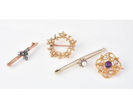 
	
		An Edwardian amethyst and half pearl brooch, designed as a quatrefoil, stamped 15ct, 3g; an Edwardian half pearl circlet