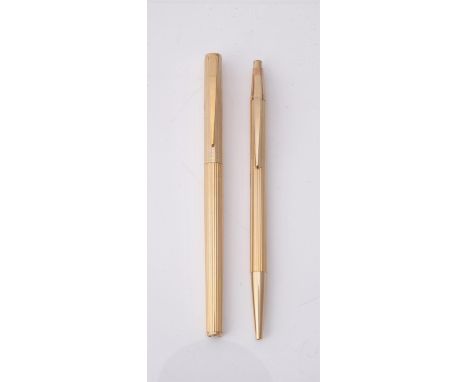 
	
		Montblanc, Noblesse, a gilt metal fountain pen and ball point pen, the fountain pen cap with a clip, the nib stamped 585