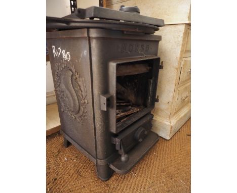 A cast iron stove and skillet 