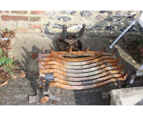 A 19th century cast iron fire grate, 24" wide, a pair of similar fire dogs, a boot scraper and a white painted aluminium gard