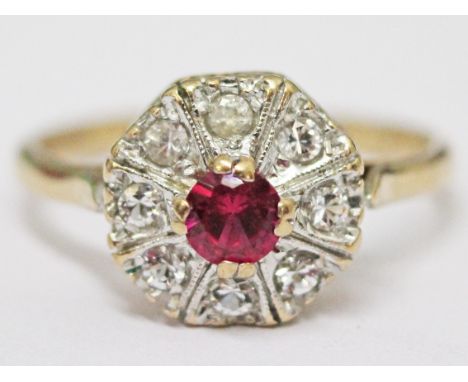 A 9ct gold ruby and white sapphire ring, gross wt. 2.6g, size P.