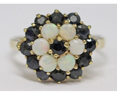 A 9ct gold opal sapphire cluster ring, gross wt. 3.9g, size S.