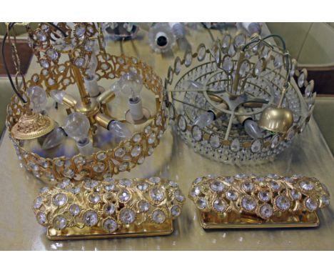 A 1970s gilt metal and glass ceiling light fitting with matching wall lights and another chandelier.