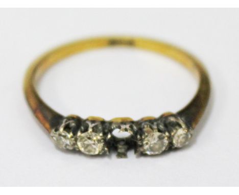 An 18ct gold diamond ring, gross wt. 1.9g, size N