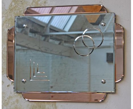 An Art Deco mirror. 71cm x 56cm.