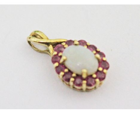 A 9ct gold ruby opal pendant, gross wt. 1.3g.