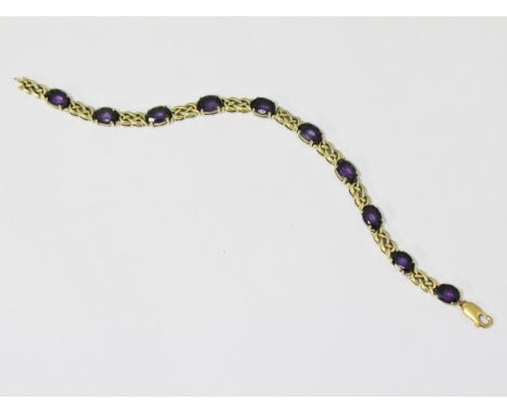 A 9ct gold amethyst bracelet, length 19cm, gross wt. 11.9g.