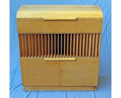 A Decca Decola radiogram having Garrard model RC60/D16 turn table, Bakelite knobs and felt interior, housed in an Art Deco bi