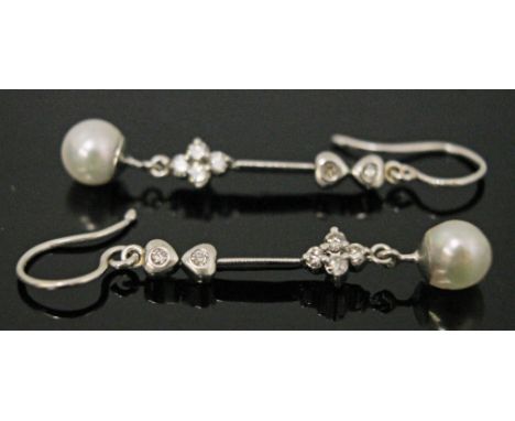 A pair of 18ct white gold diamond and pearl drop earrings, gross wt. 3.9g, length 4.5cm each.