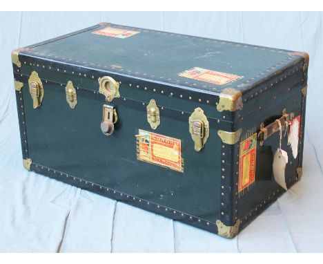 A Vacationer vintage steamer trunk having seven Cunard Line stickers. L92cm D51cm H47cm.