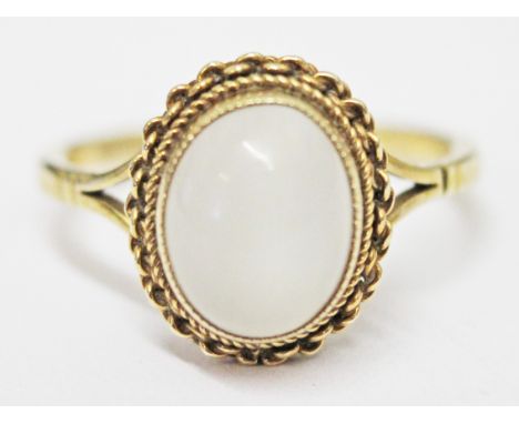 A 9ct gold ring set with a moonstone cabochon, gross wt. 3.2g, size P.