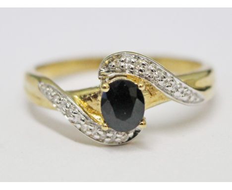 A 9ct gold diamond sapphire ring, gross wt. 2.1g, size N.