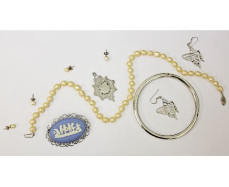 A mixed lot comprising a hallmarked silver fob and hallmarked silver mounted Wedgwood brooch, a pair of butterfly earrings ma