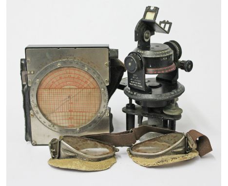 Aeronautical items comprising a pilot's knee chart, a Boes MKII astro compass and pair of old flying goggles.